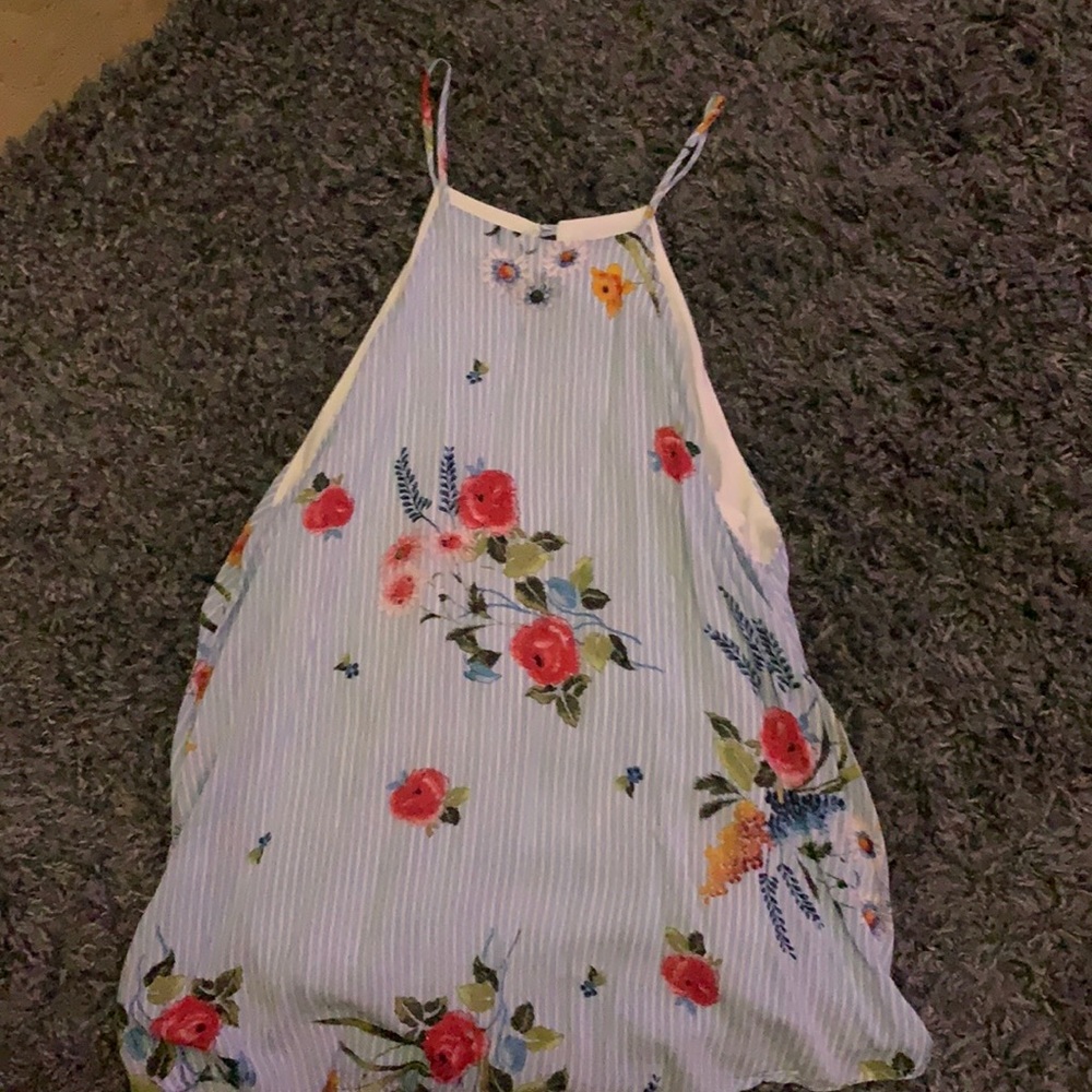 light blue and white striped floral shirt.